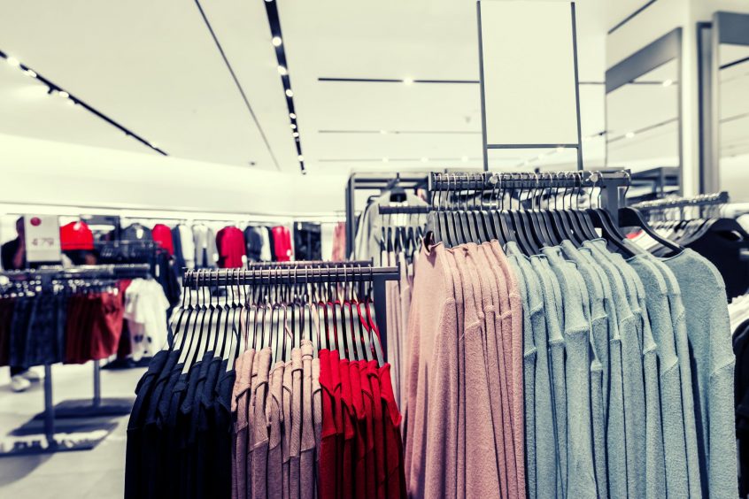 clothes hanging in a store