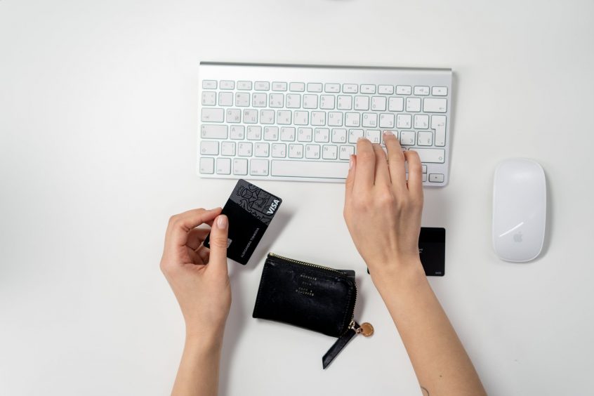 person typing keyboard shopping