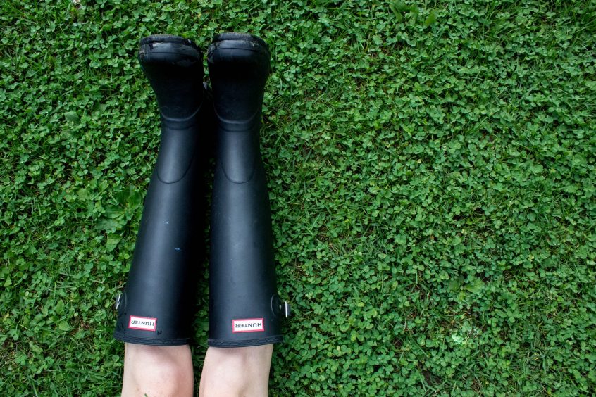 woman black rubber boots