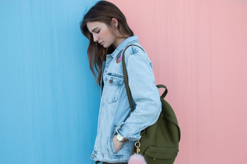 woman brunette denim jacket