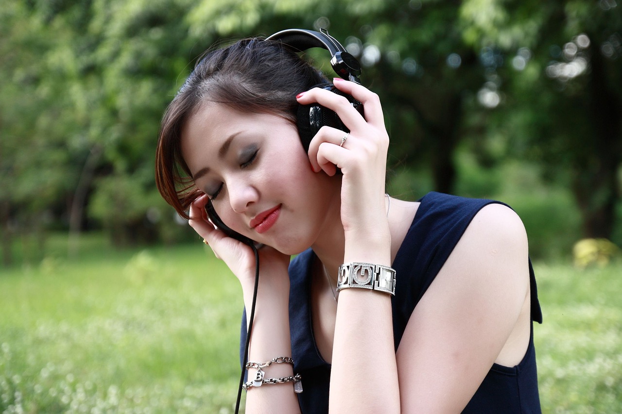 woman listening headphones