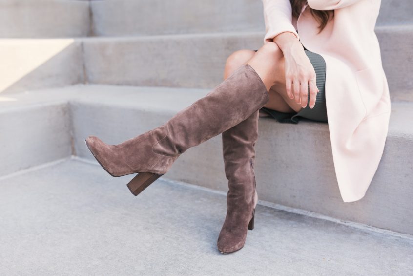 woman wearing brown leather boots